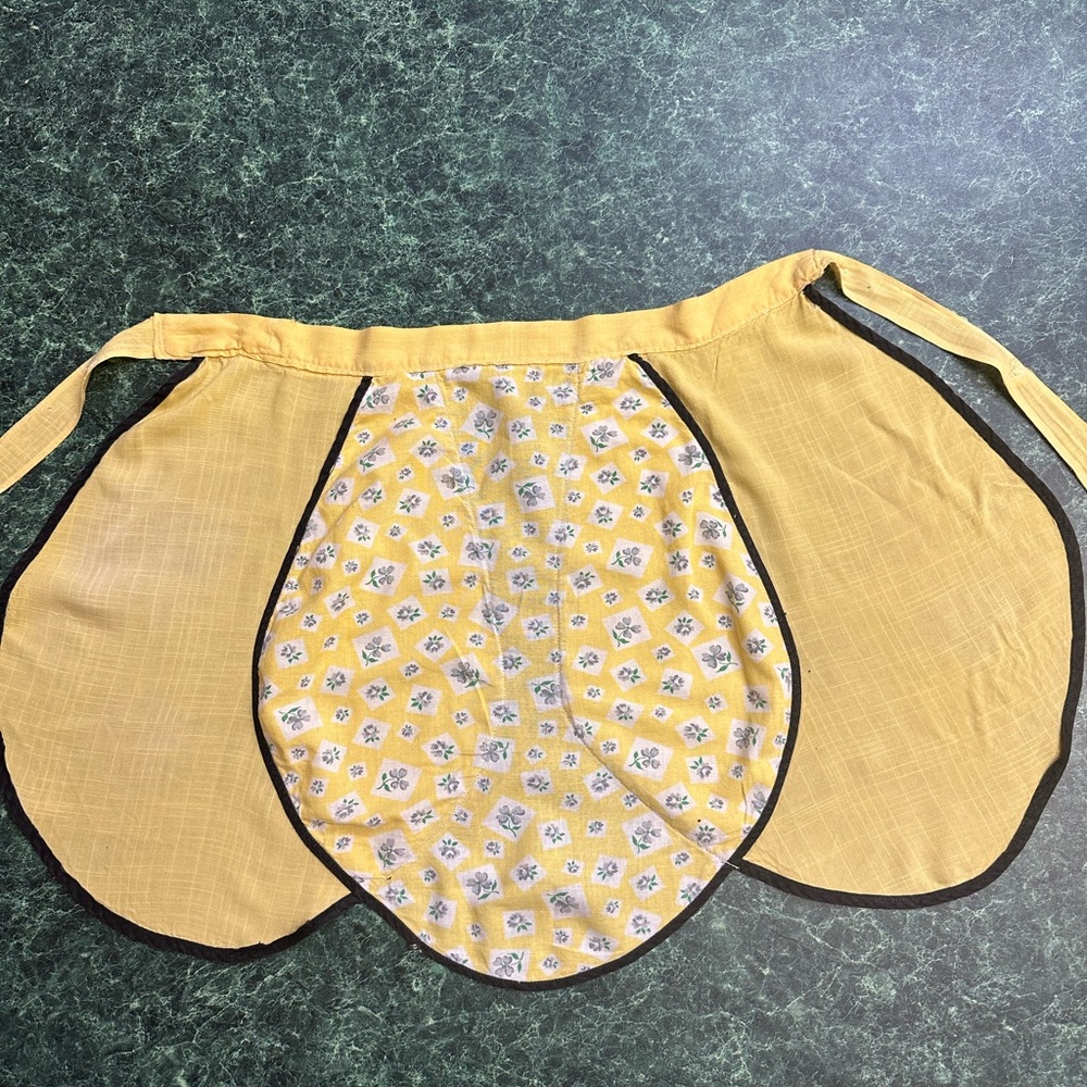 1950’s vintage yellow solid/print half apron. Feed sack and purchased fabric.